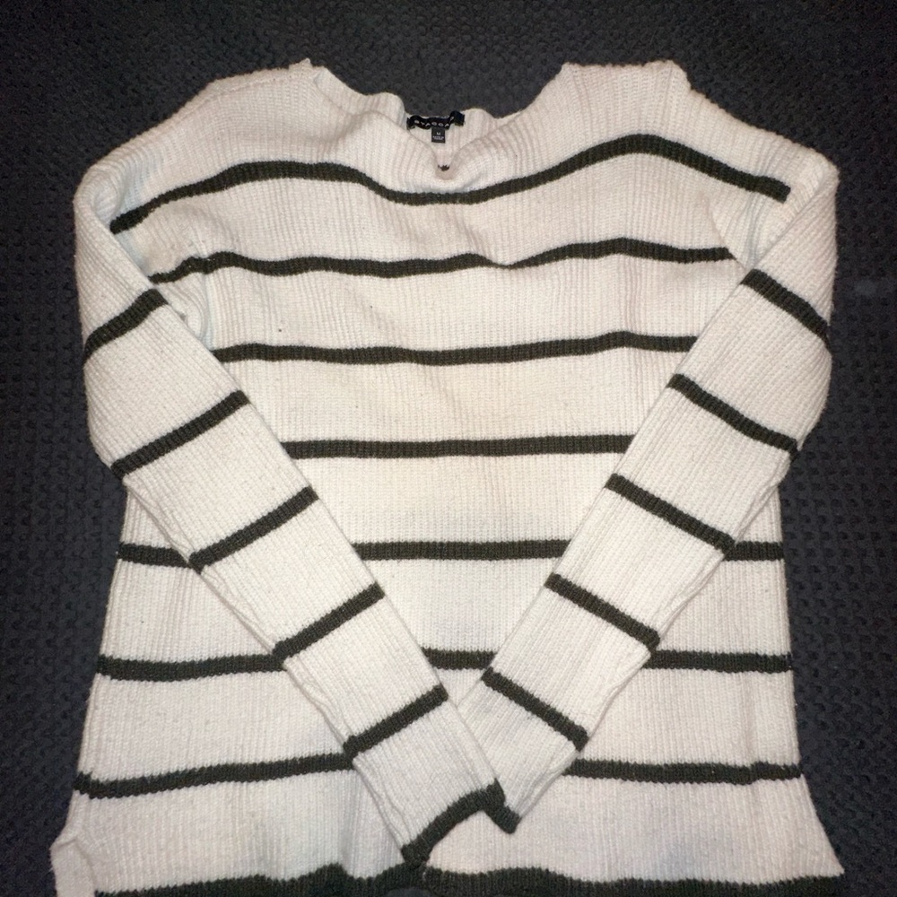 Green and white striped sweater